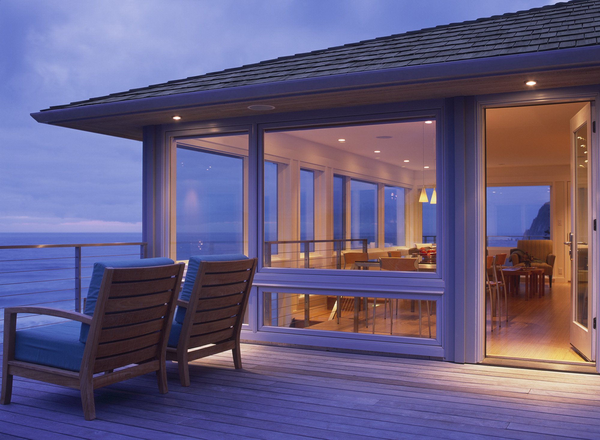 outdoor terrace at dusk next to ocean