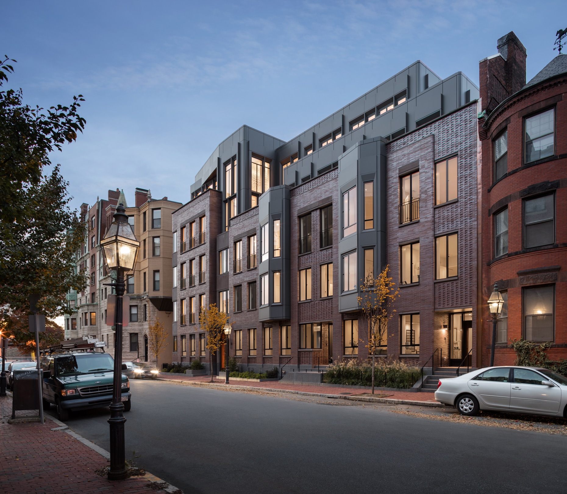 Brick buildings line a city street