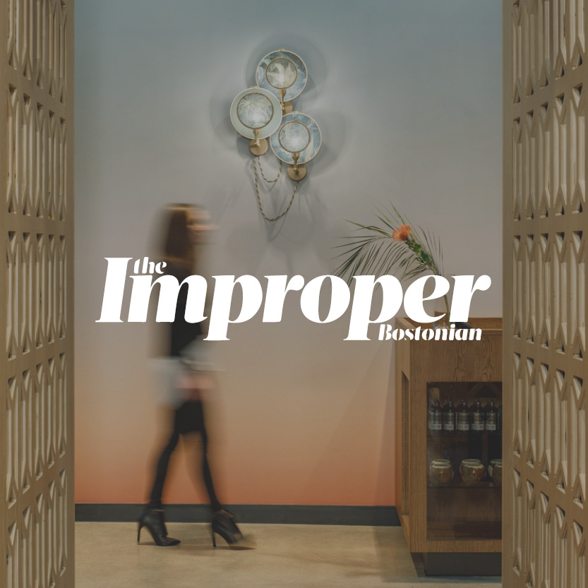 The Improper Bostonian logo with decorative hallway background