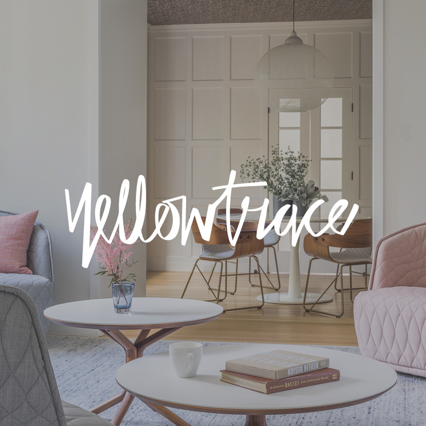 Yellowtrace logo with luxury livign room background