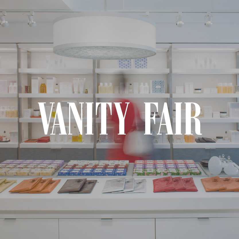 Vanity Fair logo with retail store background