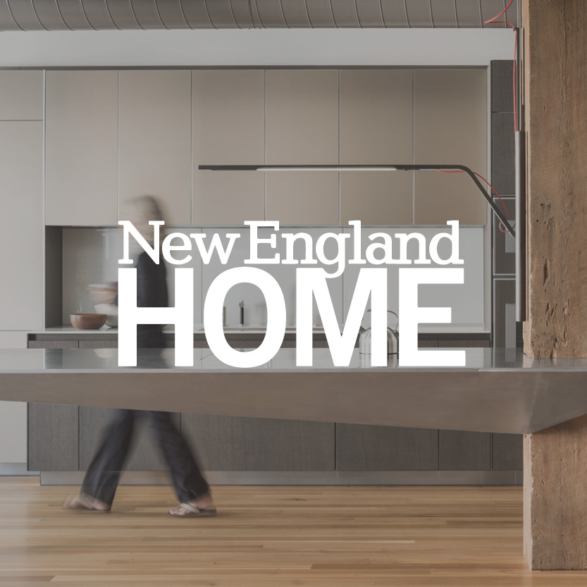 New England Home logo with luxury kitchen background