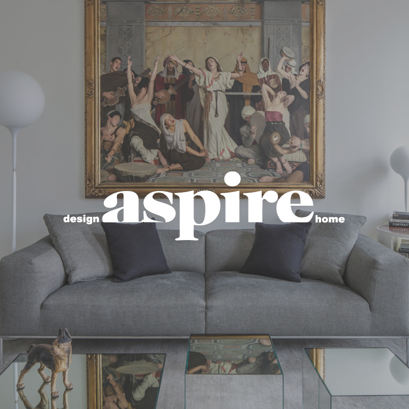 Aspire logo with upscale living room background