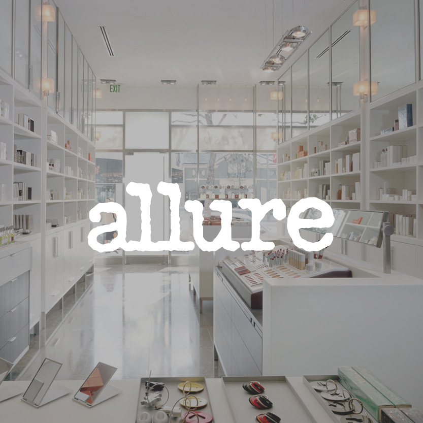 Allure logo with cosmetic store background