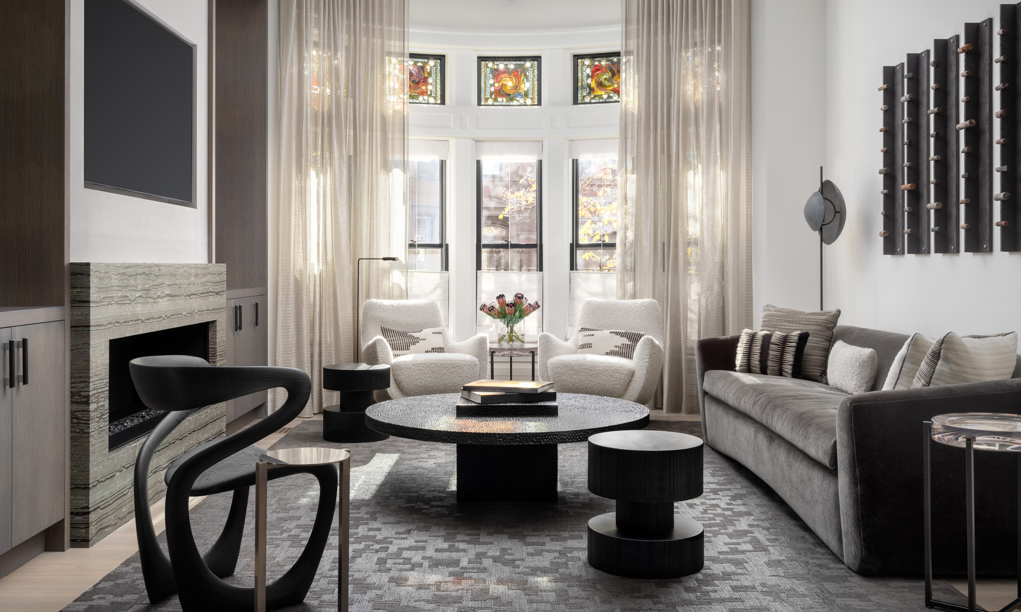 View of a modern townhouse with lofted ceilings and large windows