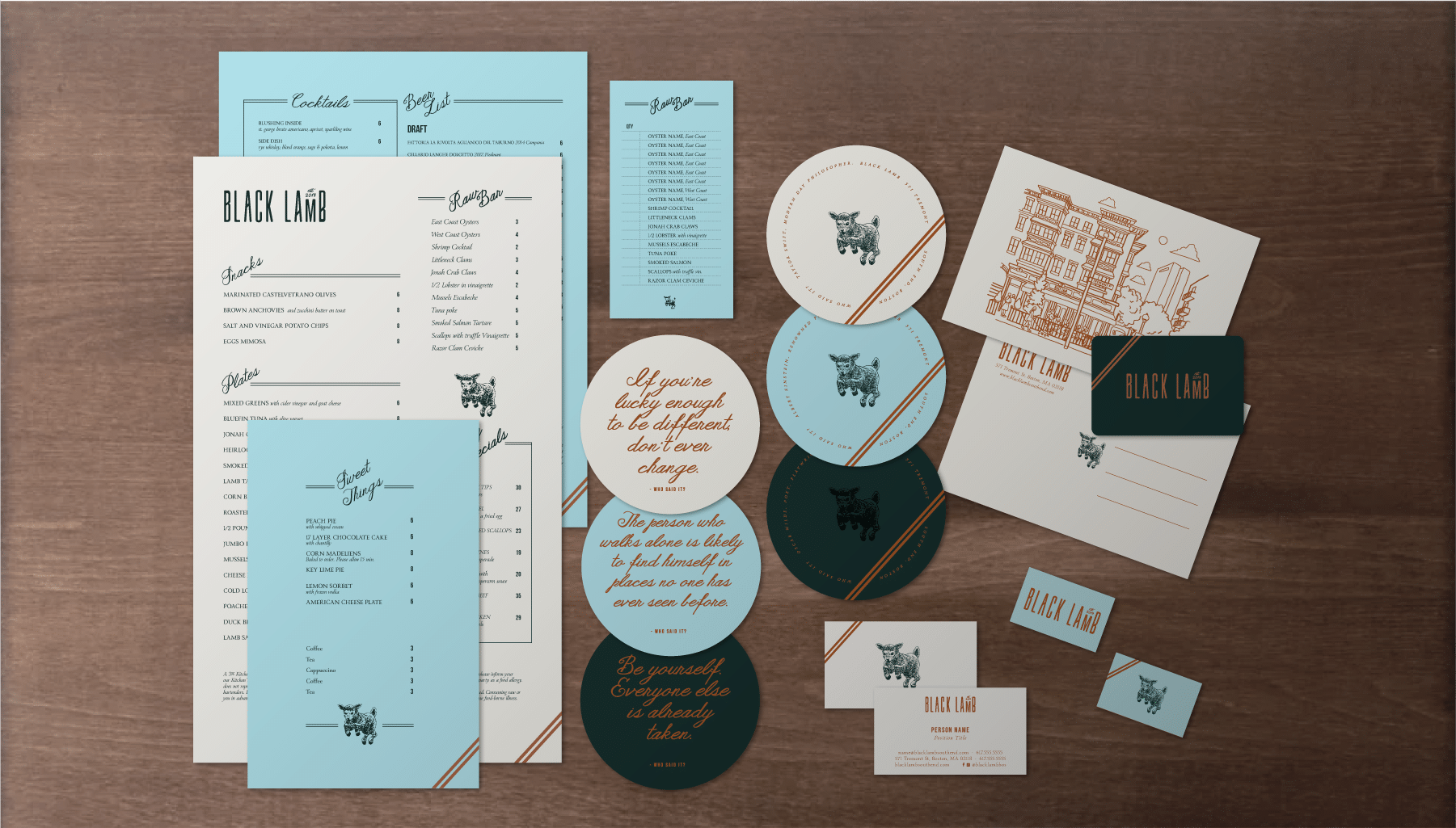 A spread of restaurant paper design collateral such as menus, coasters, and gift cards on a dark wood background