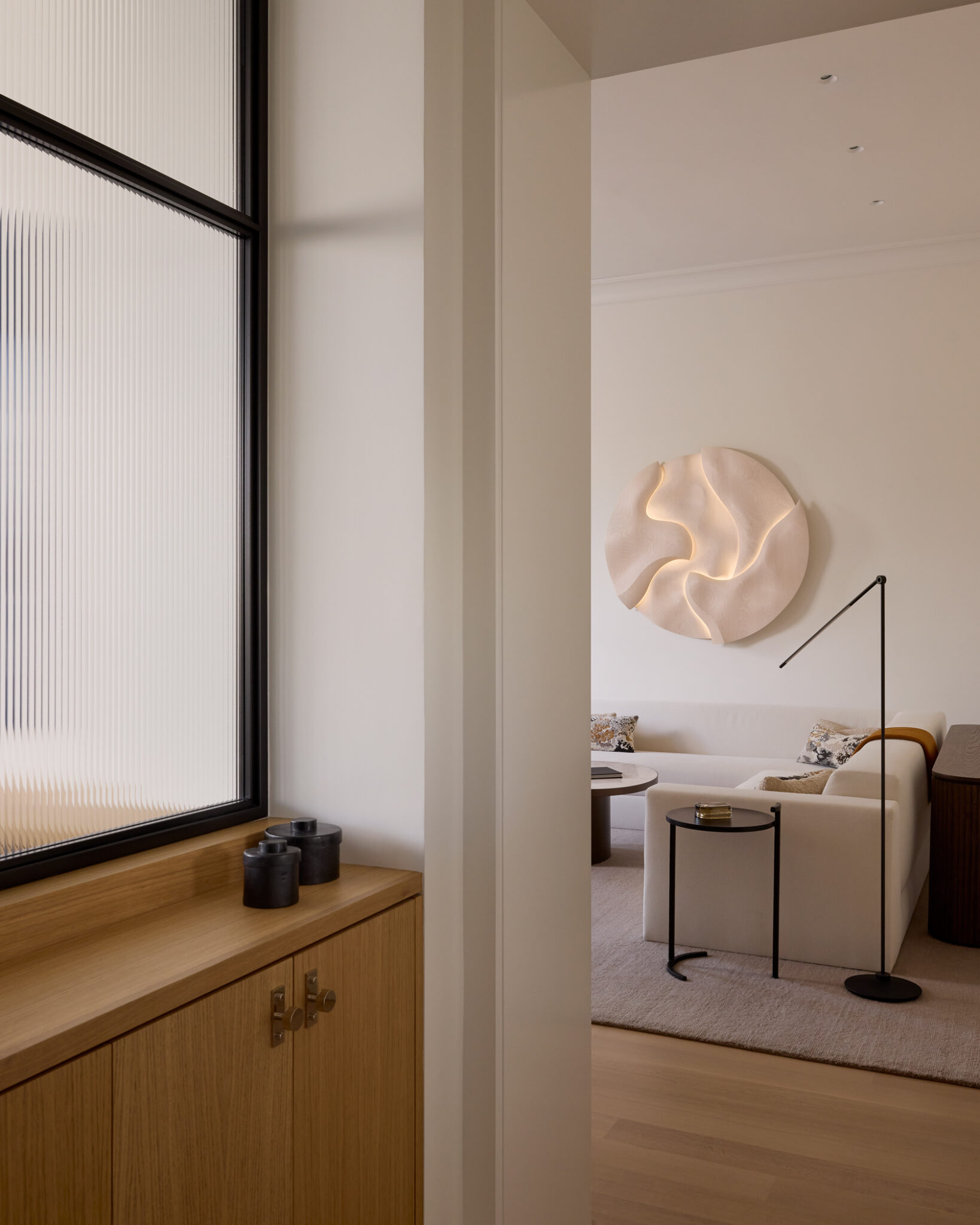 elevated minimalism entry looking into living room
