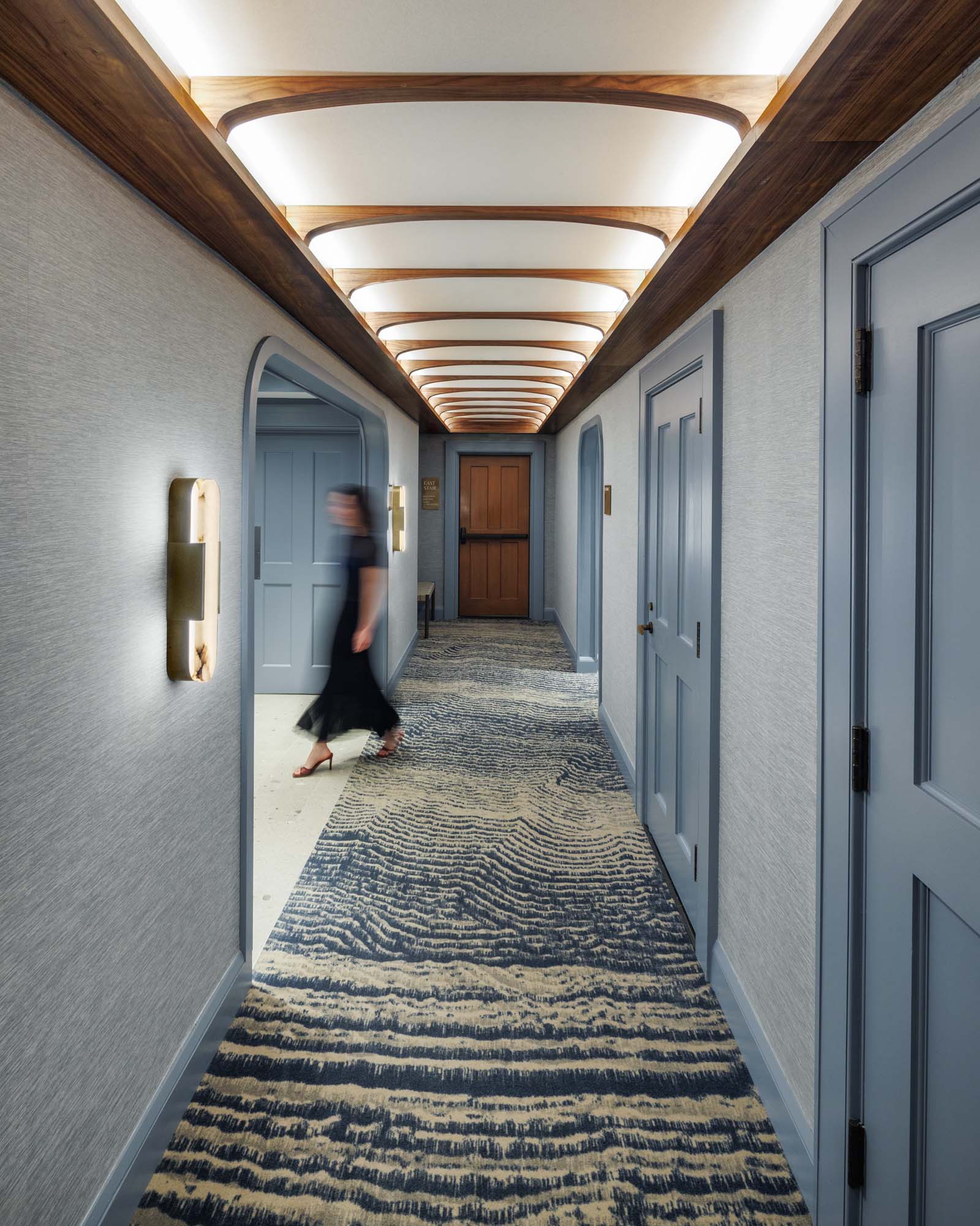 commercial interior design of circulation space with person